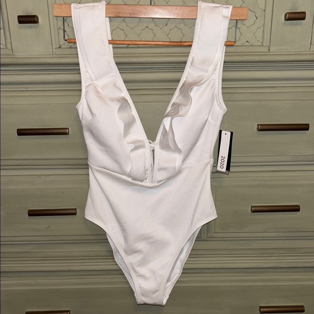NWT. Kenneth Cole New York. One piece swimsuit. Size M.